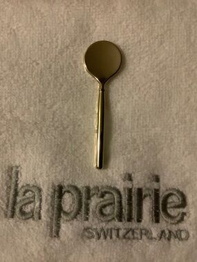 Authentic La Prairie gold-tone spatula applicator
